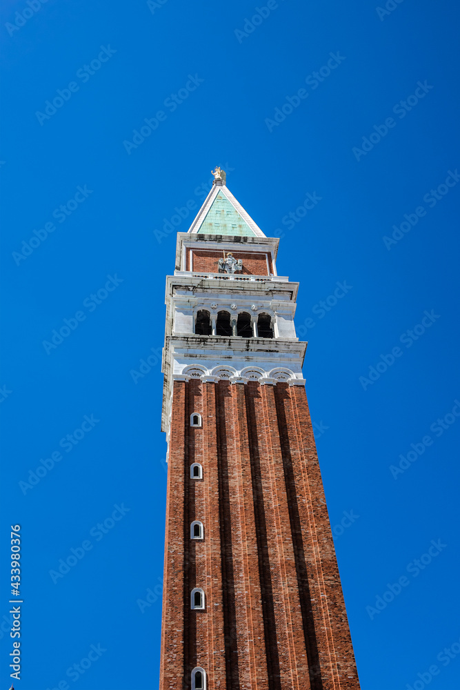 98.6 meters St Mark's Campanile (Campanile di San Marco, ninth century) - famous bell tower of St Mark's Basilica. Piazza San Marco, Venice, Italy.