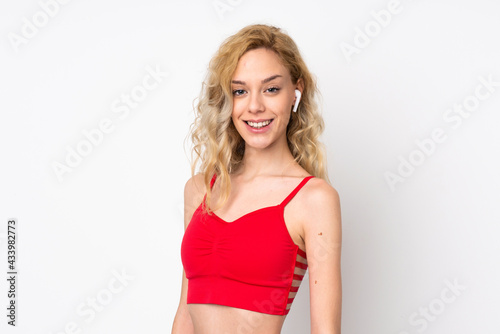 Young blonde woman isolated on white background happy and smiling © luismolinero
