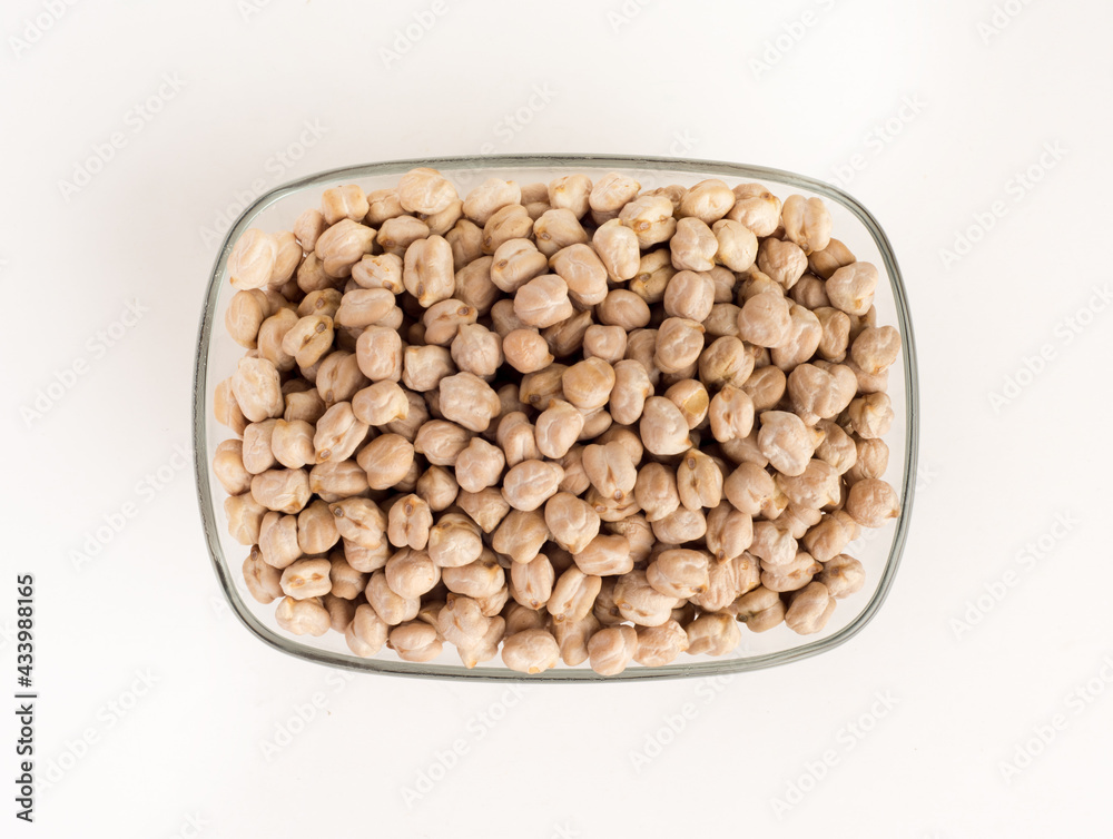 Chickpea in glass bowl on white background. Chickpea in glass bowl on white background.