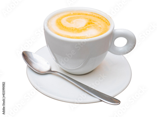 Caffè macchiato isolated on white background. Espresso coffee with milk foam in a small cup.