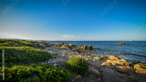 sea and rocks on the beach of sardegna