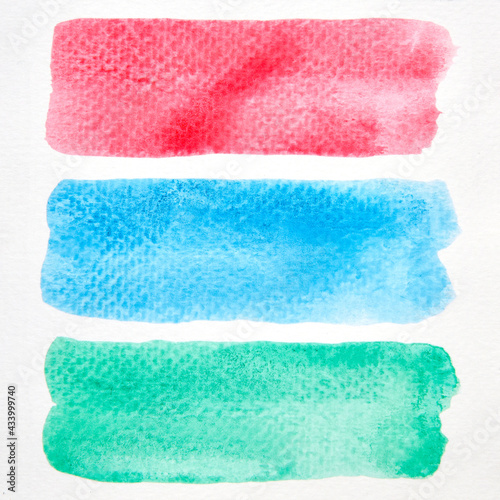 a photo image of abstract red blue and green watercolor on paper, hand paint of red blue and green watercolor for background, a primary additive color of light wet technique on paper