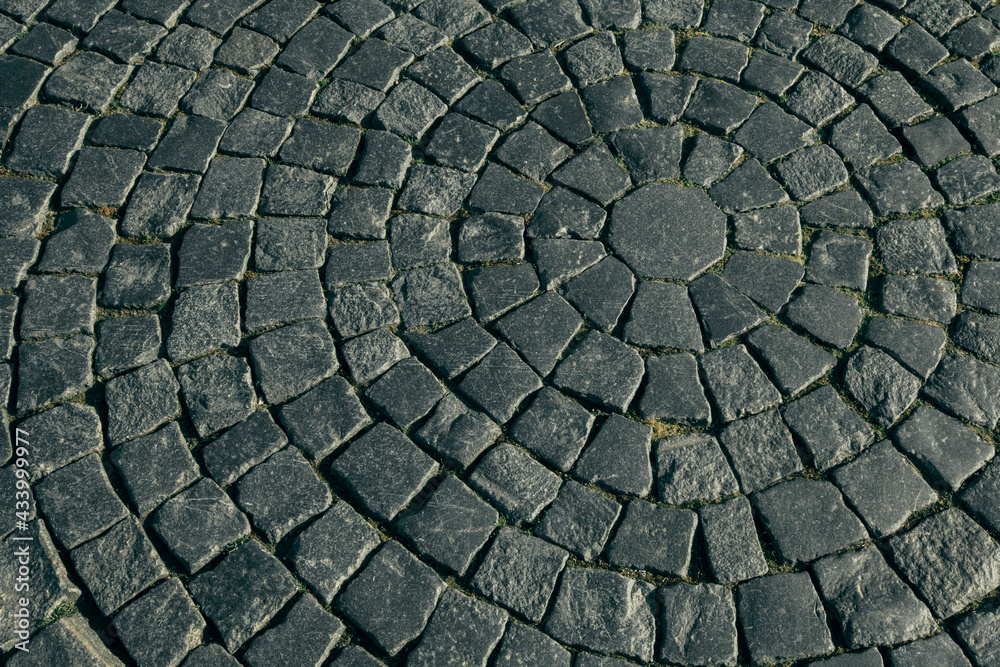 View of cobblestone street. The texture of the city pavement. View of cobblestone street. The texture of the city pavement.