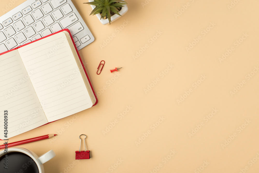 Top view photo of white keyboard flowerpot open red planner pencil binder clip pin and cup of coffee on isolated beige background with copyspace Top view photo of white keyboard flowerpot open red planner pencil binder clip pin and cup of coffee on isolated beige background with copyspace