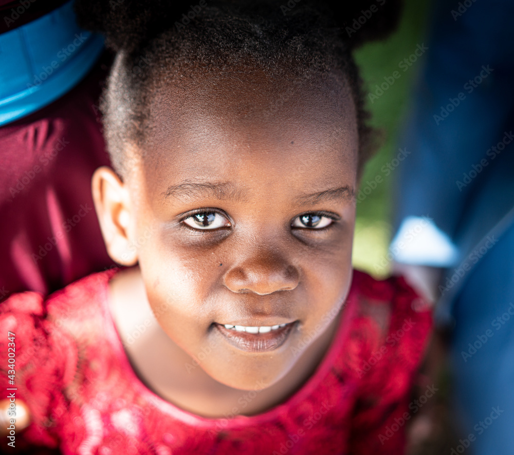 Cute little black African girl close up Cute little black African girl close up