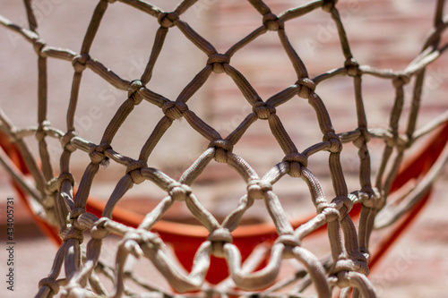 Close-up knots of an old basketball net