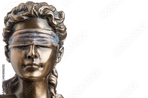 Portrait of the blindfolded goddess of justice Themis isolated on white background with copy space, as a legal concept
