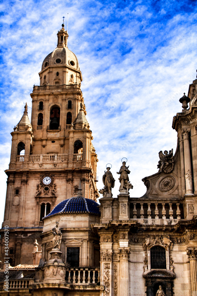 Tower bell, sculptures and carved stone details of the Cathedral of Murcia