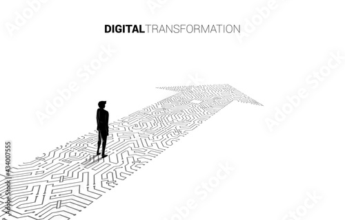 Silhouette of businessman standing on the arrow dot connect circuit board style. concept of digital transformation of business.