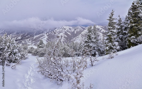 Little Black Mountain Peak hiking trail snow views winter via Bonneville Shoreline Trail, Wasatch Front Rocky Mountains, by Salt Lake City, Utah. United States.
