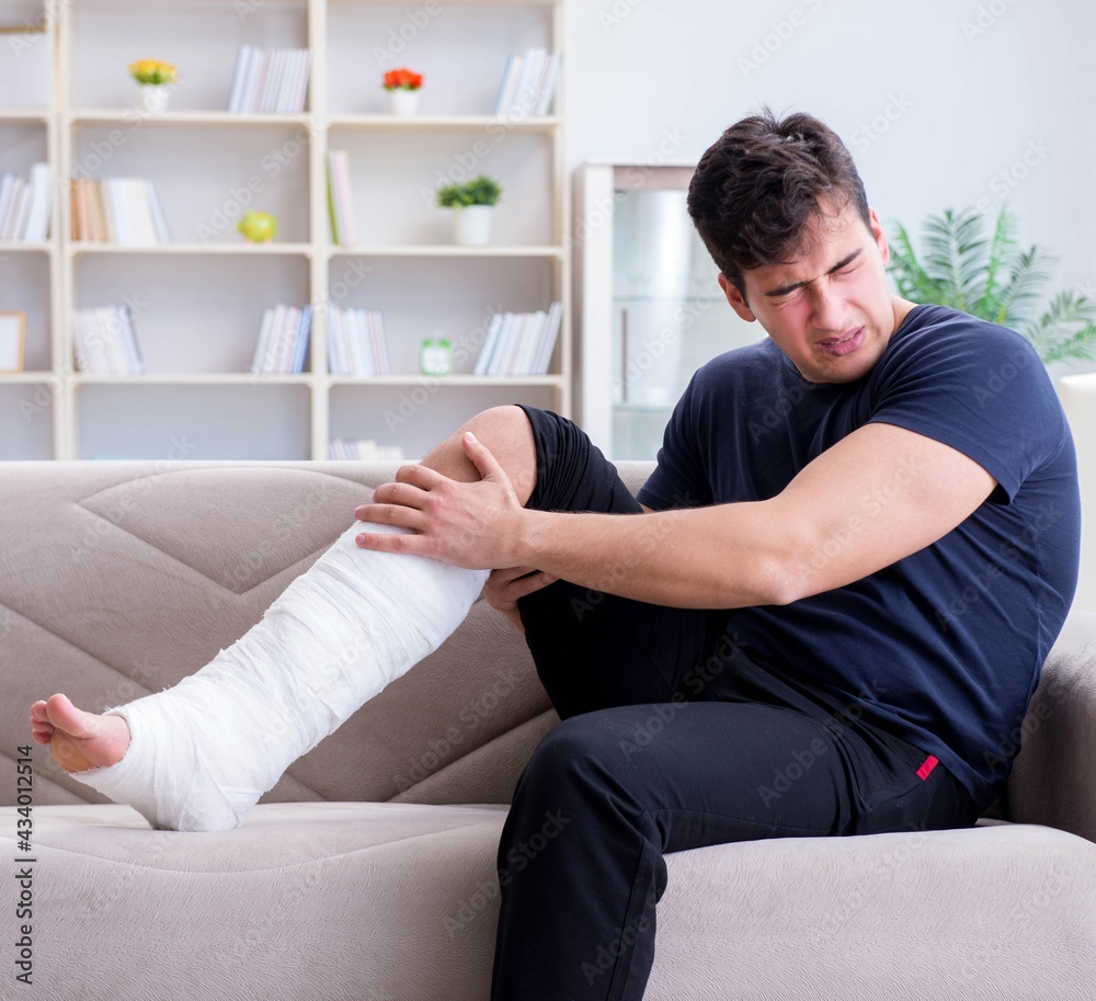 Man with broken leg recovering at home Man with broken leg recovering at home