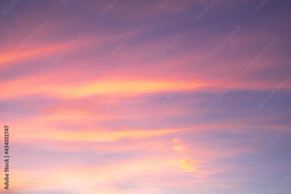beautiful orange clouds  and sunlight on the blue sky perfect for the background, take in morning,Twilight
