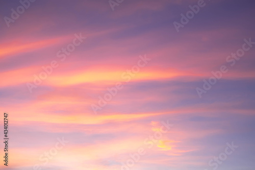 beautiful orange clouds and sunlight on the blue sky perfect for the background, take in morning,Twilight
