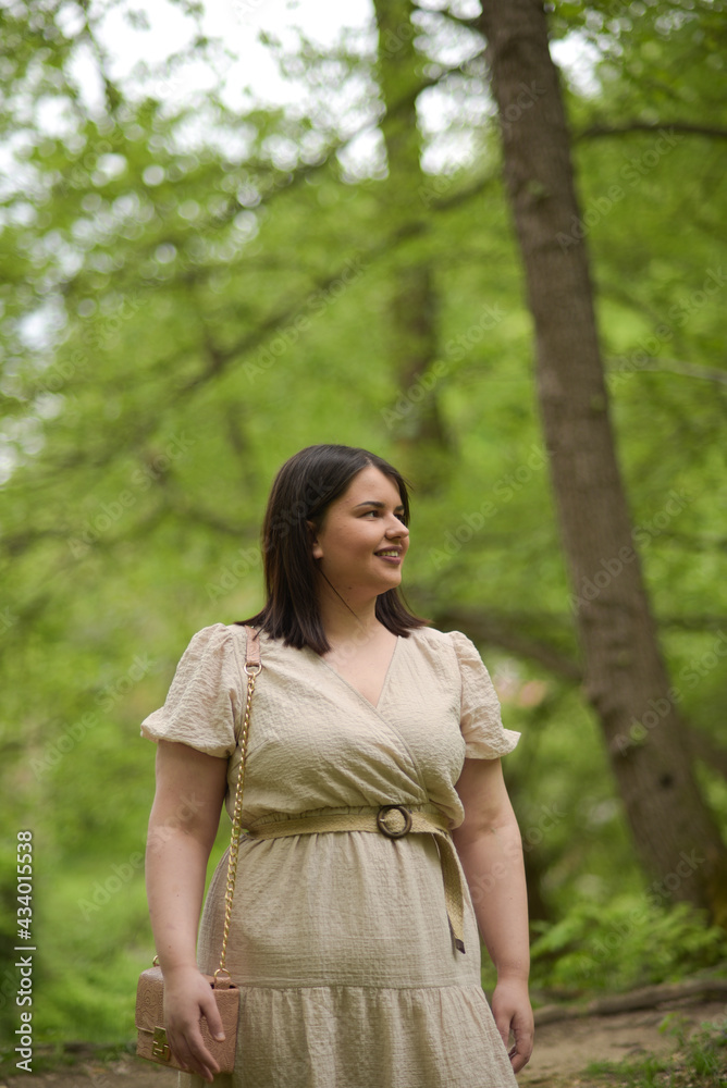 Young girl with a beautiful smile in nature Young girl with a beautiful smile in nature
