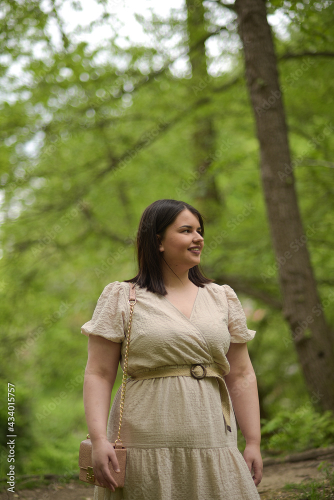 Young girl with a beautiful smile in nature Young girl with a beautiful smile in nature