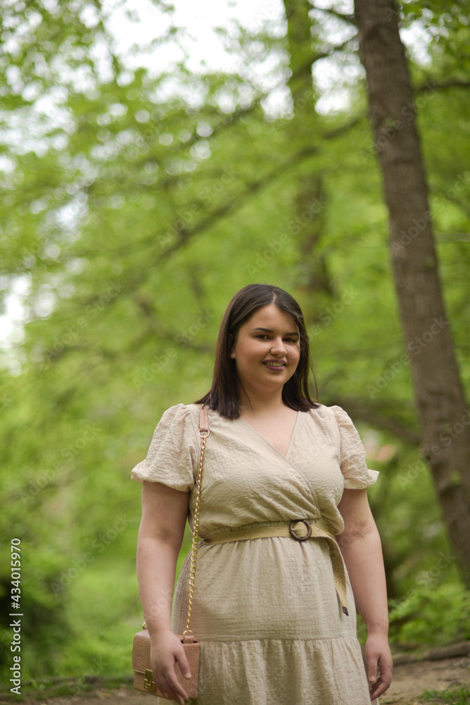 Young girl with a beautiful smile in nature Young girl with a beautiful smile in nature