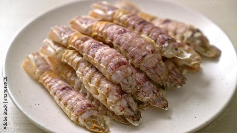 steamed crayfish or mantis shrimps or stomatopods with spicy seafood sauce steamed crayfish or mantis shrimps or stomatopods with spicy seafood sauce