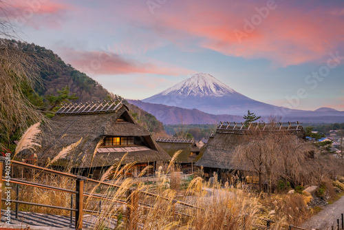Old Japanese style house and Mt. Fuji at sunset, Japan