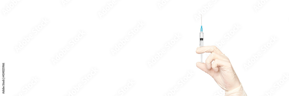 Person in white glove hold vaccine bottle with syringe. Injection pharmacy concept. Medical nurse therapy. People hand health science. Horizontal banner Person in white glove hold vaccine bottle with syringe. Injection pharmacy concept. Medical nurse therapy. People hand health science. Horizontal banner
