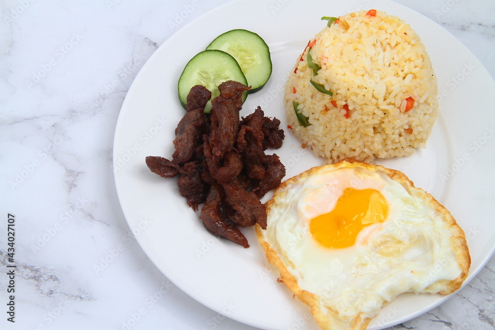 Freshly cooked Filipino food called Tapsilog Freshly cooked Filipino food called Tapsilog