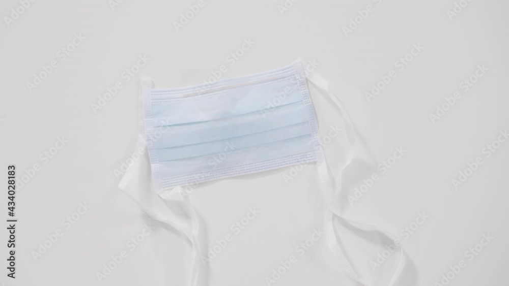Medical blue masks for coronavirus outbreak on a white background. Medical blue masks for coronavirus outbreak on a white background.