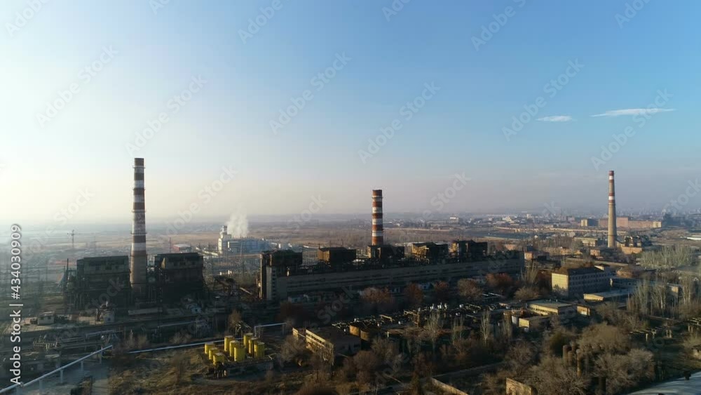 Aerial view over chemical factory and power plant with pipelines. Aerial view over chemical factory and power plant with pipelines.
