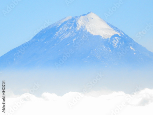 Este es el volcan mas alto de mexico, el Pico de Orizaba, visto desde unos kilometros en otra montaña El Cofre de Perote photo