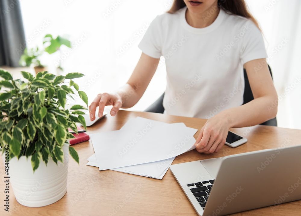 Young girl working at home office Young girl working at home office
