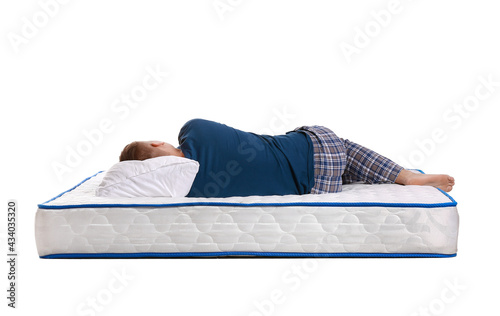 Young man sleeping on soft ...