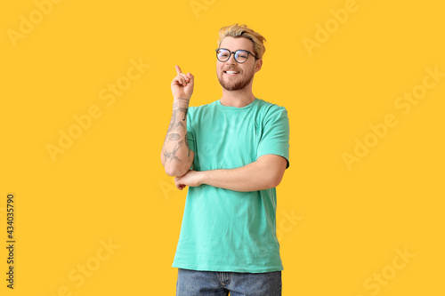 Young man with eyeglasses a...