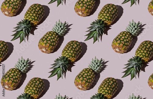 Pattern of pineapple on purple background