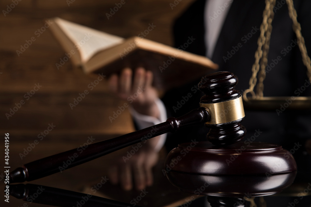 People, law theme, mallet of judge, wooden gavel People, law theme, mallet of judge, wooden gavel