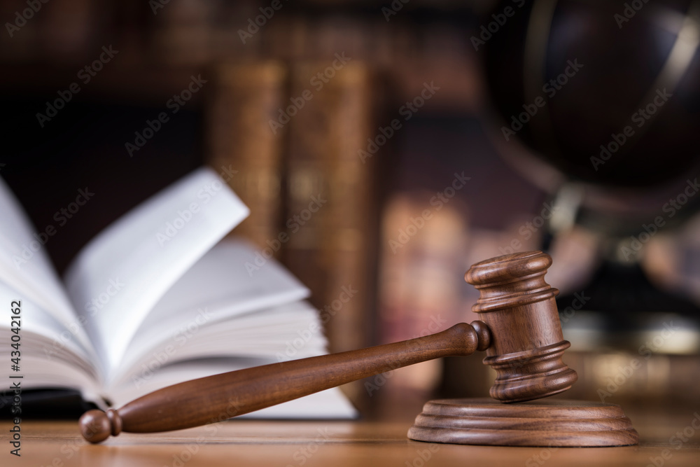 Justice Scale and Gavel globe concept Justice Scale and Gavel globe concept