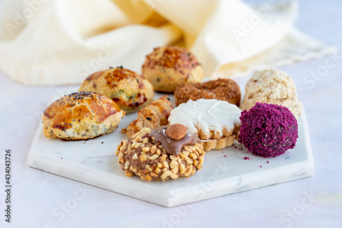 Different kinds of sweet cookies on a white background