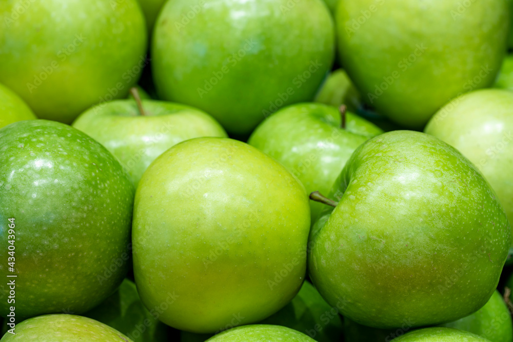 Organic green apple. Close-up apple background