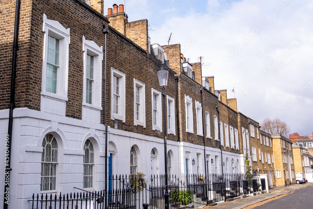 Fototapeta premium Residential road of terraced houses in Chelsea & Kensington borough of London - UK
