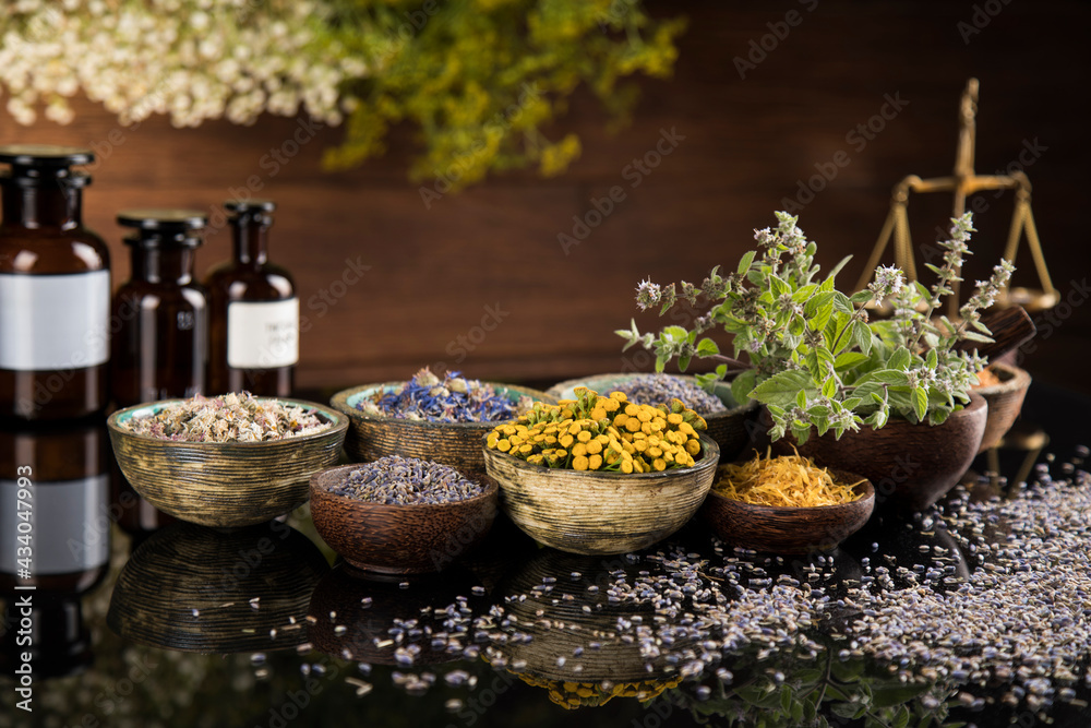 Natural medicine in black mirror background