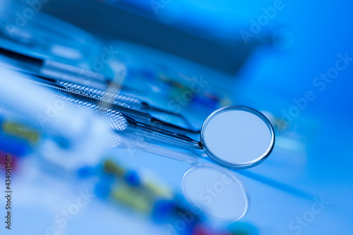 Dentist equipment on blue background