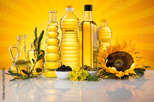 Bottles of sunflower oil with flower
