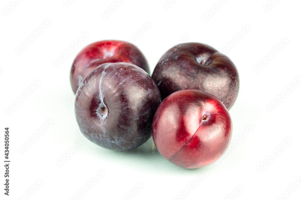 Plums. Ripe natural and organic plums isolated on white background. Purple cherry plums. Part of set.