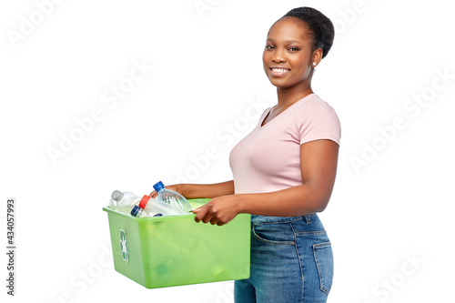 Obraz na plátně recycling, waste sorting and sustainability concept - smiling young african amer