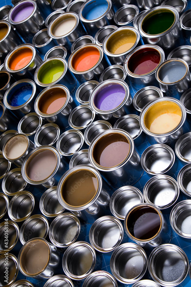 Group of tin metal cans with color paint Group of tin metal cans with color paint
