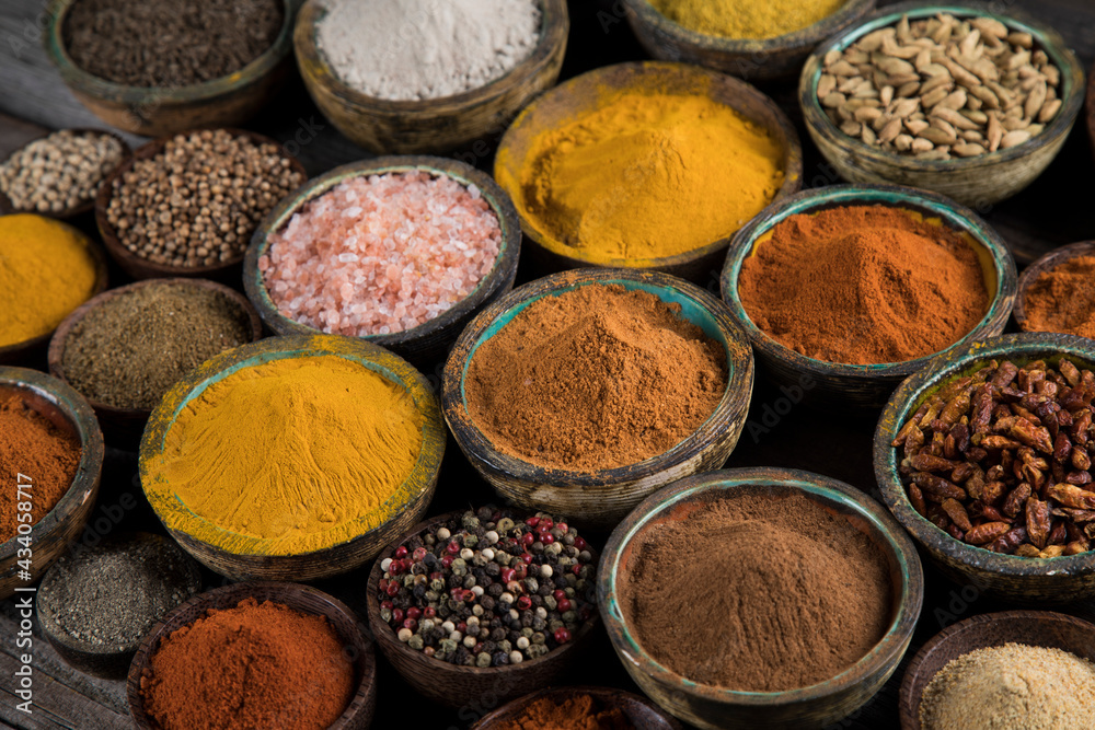 Cookbook and various spices background Cookbook and various spices background