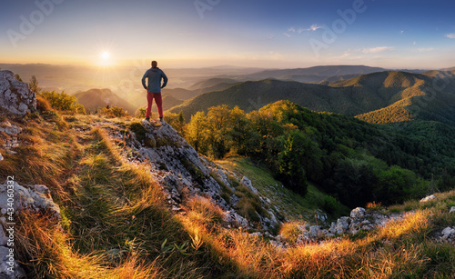 Slovakia mountain peak Drienok at sunset - panorama landscape with man silhouette photo