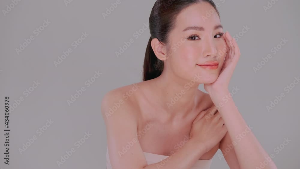 Beautiful face of Asian young woman with natural skin. Portrait of attractive girl with soft make-up and white skin. Beautiful face of Asian young woman with natural skin. Portrait of attractive girl with soft make-up and white skin.
