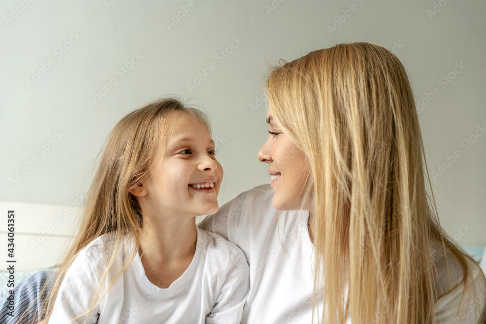 Mom with little cute girl close-up portrait. Mom with little cute girl close-up portrait.