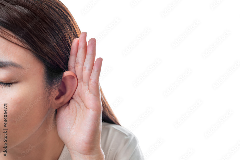 Asian woman wear white t-shirt hearing loss or hard of hearing and cupping her hand behind her ear isolate on white background , Deaf concept. Asian woman wear white t-shirt hearing loss or hard of hearing and cupping her hand behind her ear isolate on white background , Deaf concept.