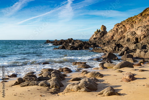 Sandy beach among the rocks Houat island France