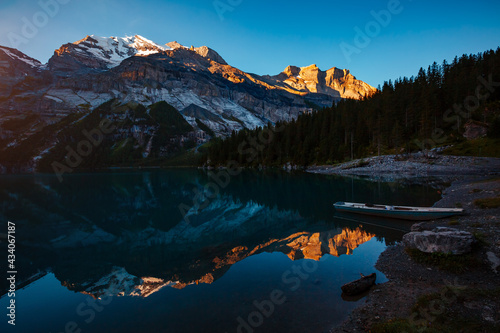 Excellent view of the lake Oeschinensee in the morning. Location place Swiss alps, Kandersteg district, Europe.