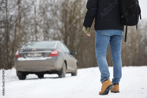 Wallpaper Mural Man and car. Winter walk and car repair. Torontodigital.ca